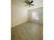 Bright bedroom featuring ceiling fan and wood-look flooring at 10290 Gilmore Canyon Ct # 103, Las Vegas, NV 89129