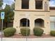 Building exterior showing reserved parking and building number at 10290 Gilmore Canyon Ct # 103, Las Vegas, NV 89129