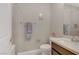 Well-lit bathroom featuring tile walls, modern fixtures, and a clean aesthetic at 1189 Hillside Peak St, Henderson, NV 89002