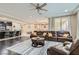 Open-concept living space with seamless flow to kitchen and comfortable seating area at 1189 Hillside Peak St, Henderson, NV 89002
