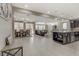 Open-concept living space featuring a kitchen island, dining area, and living room with great natural light at 1189 Hillside Peak St, Henderson, NV 89002