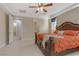 A spacious bedroom featuring a king-size bed with an attached bathroom at 1189 Hillside Peak St, Henderson, NV 89002