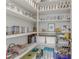 This pantry is stocked with a variety of food items and features organized shelving for easy access at 1189 Hillside Peak St, Henderson, NV 89002