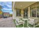 Paver patio with a swing and outdoor furniture, perfect for entertaining at 1189 Hillside Peak St, Henderson, NV 89002