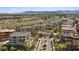 Community aerial showing multiple residences, lush landscaping, and a beautiful golf course at 120 Los Cabos Dr # 301, Las Vegas, NV 89144