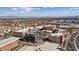 Elevated view of a vibrant neighborhood with multiple buildings and well-maintained roads at 120 Los Cabos Dr # 301, Las Vegas, NV 89144