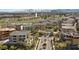 An aerial view of a luxurious community showcasing lush landscaping and a nearby golf course at 120 Los Cabos Dr # 301, Las Vegas, NV 89144