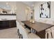 A stylish dining room features modern decor, a dining table, and is perfect for entertaining at 120 Los Cabos Dr # 301, Las Vegas, NV 89144