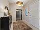 A sleek hallway with an elevator, designer lighting, and stylish decor creates a luxurious entry at 120 Los Cabos Dr # 301, Las Vegas, NV 89144