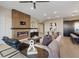 Open living room with modern fireplace, comfortable seating, and access to the kitchen at 120 Los Cabos Dr # 301, Las Vegas, NV 89144