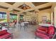 Covered patio area with ceiling fans and fireplace provides relaxed outdoor atmosphere at 120 Los Cabos Dr # 301, Las Vegas, NV 89144