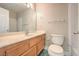 Clean bathroom with a bathtub and wood vanity at 1800 Edmond St # 124, Las Vegas, NV 89146