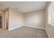 Spacious bedroom with neutral wall colors and carpet at 1800 Edmond St # 124, Las Vegas, NV 89146