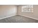 Spacious bedroom with neutral walls and carpet flooring at 1800 Edmond St # 124, Las Vegas, NV 89146