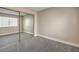 Bright bedroom with mirrored closet doors and neutral walls at 1800 Edmond St # 124, Las Vegas, NV 89146