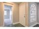 Condo entryway with door and view into living area at 1800 Edmond St # 124, Las Vegas, NV 89146