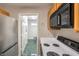 Kitchen area with appliances and access to laundry at 1800 Edmond St # 124, Las Vegas, NV 89146