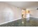 Bright living room with tile floor and kitchen view at 1800 Edmond St # 124, Las Vegas, NV 89146