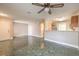 Bright living room with tile flooring and ceiling fan at 1800 Edmond St # 124, Las Vegas, NV 89146