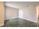 Living room with tile floors and neutral walls at 1800 Edmond St # 124, Las Vegas, NV 89146