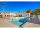 Community swimming pool with surrounding patio area at 1800 Edmond St # 124, Las Vegas, NV 89146