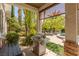 Outdoor kitchen with stainless steel grill and patio seating at 1975 Alcova Ridge Dr, Las Vegas, NV 89135