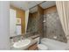 Well-appointed bathroom with slate tile and a large shower/tub combo at 1975 Alcova Ridge Dr, Las Vegas, NV 89135