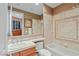 Clean bathroom with a bathtub, toilet and sink at 1975 Alcova Ridge Dr, Las Vegas, NV 89135