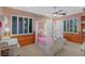 Charming bedroom with a canopy bed and built-in shelves at 1975 Alcova Ridge Dr, Las Vegas, NV 89135
