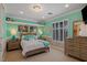 Serene bedroom with light wood accents and a cozy bed at 1975 Alcova Ridge Dr, Las Vegas, NV 89135