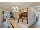 Bright dining room with a large table and built-in cabinetry at 1975 Alcova Ridge Dr, Las Vegas, NV 89135