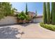 Elegant home with a large driveway and nicely landscaped yard at 1975 Alcova Ridge Dr, Las Vegas, NV 89135