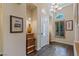 Bright and airy entryway with tile flooring and elegant decor at 1975 Alcova Ridge Dr, Las Vegas, NV 89135