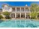 Stunning two-story home with a large pool and patio at 1975 Alcova Ridge Dr, Las Vegas, NV 89135
