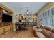Game room boasts a large TV, desk, and ample storage at 1975 Alcova Ridge Dr, Las Vegas, NV 89135