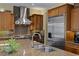 Modern kitchen with stainless steel appliances and granite countertops at 1975 Alcova Ridge Dr, Las Vegas, NV 89135