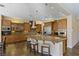 Gourmet kitchen boasts granite countertops and stainless steel appliances at 1975 Alcova Ridge Dr, Las Vegas, NV 89135