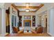 Elegant living room with a fireplace and built-in shelving units at 1975 Alcova Ridge Dr, Las Vegas, NV 89135