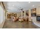 Open living room with a view of the kitchen and a large sectional sofa at 1975 Alcova Ridge Dr, Las Vegas, NV 89135