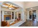 Spacious living room with a cozy fireplace and built-in shelving at 1975 Alcova Ridge Dr, Las Vegas, NV 89135