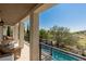 Covered patio with pool and golf course views at 1975 Alcova Ridge Dr, Las Vegas, NV 89135