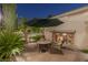 Cozy patio with a fireplace and seating area, perfect for outdoor enjoyment at 1975 Alcova Ridge Dr, Las Vegas, NV 89135