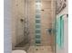 Spa-like shower with a pebble floor and glass enclosure at 1975 Alcova Ridge Dr, Las Vegas, NV 89135