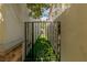 Narrow side yard with artificial turf and gate at 1975 Alcova Ridge Dr, Las Vegas, NV 89135