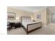 Primary bedroom with king-size bed and ensuite bath at 2000 N Fashion Show Dr # 3709, Las Vegas, NV 89109