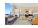 Living room with city view, sofa, chairs, and coffee table at 2000 N Fashion Show Dr # 3709, Las Vegas, NV 89109