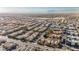 An aerial view of a residential neighborhood with mountains in the distance at 2905 Vigilante Ct, North Las Vegas, NV 89081