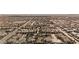 High-angle shot of a residential neighborhood showcasing uniform housing and green spaces at 2905 Vigilante Ct, North Las Vegas, NV 89081