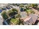 Overhead image of a park with a gazebo and playground amidst the trees, surrounded by the community homes at 2905 Vigilante Ct, North Las Vegas, NV 89081