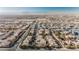 High-angle view of homes in a planned community, featuring neat rows, streets, and manicured landscaping at 2905 Vigilante Ct, North Las Vegas, NV 89081